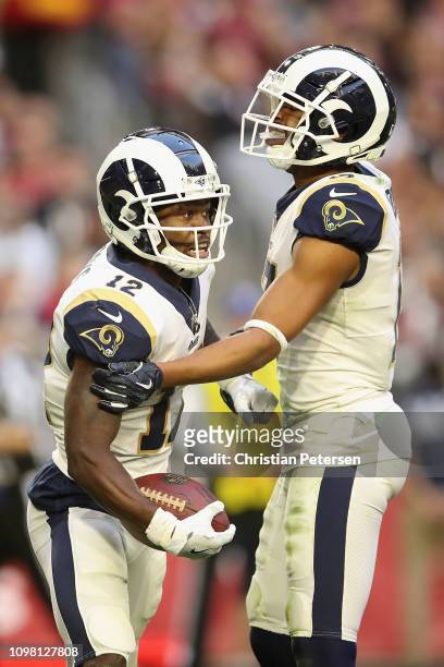 Wide receivers Brandin Cooks and Robert Woods of the Los Angeles Rams celebrate during the NFL game against the Arizona Cardinals at State Farm...