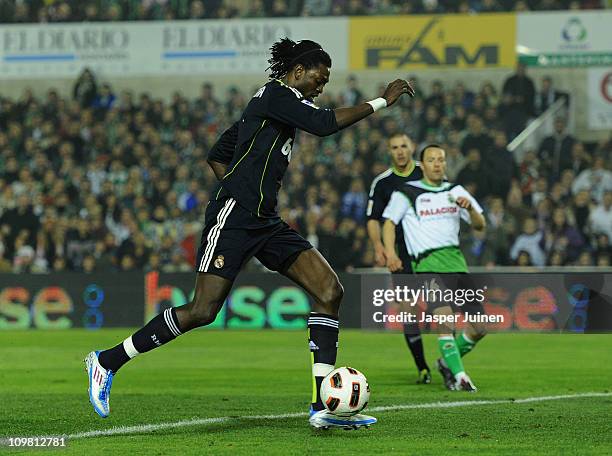 Emanuel Abadayour of Real Madrid scores his sides opening goal during the la Liga match between Racing Santander and Real Madrid at El Sardinero...