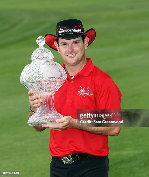 Rory Sabbatini of South Africa poses with the trophy after winning The Honda Classic at PGA National Resort and Spa on March 6, 2011 in Palm Beach...
