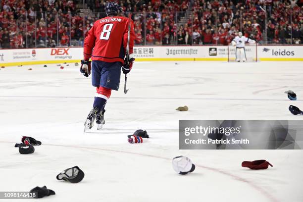 Alex Ovechkin of the Washington Capitals celebrates after scoring his third goal of the game for a hat trick against the San Jose Sharks during the...