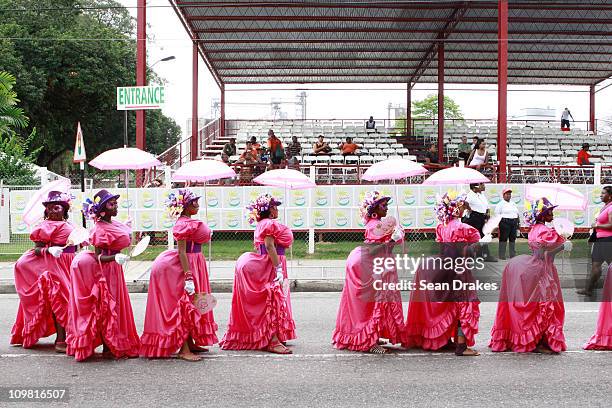 Masqueraders, representing the Dame Lorraine, at the Nostalgia parade of Trinidad Carnival on March 6, 2011 in Port of Spain, Trinidad.