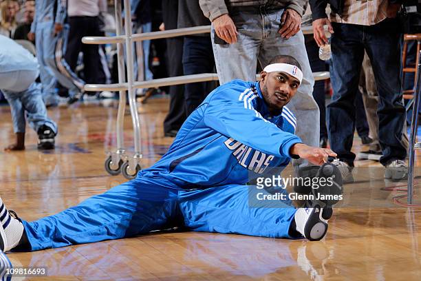 Corey Brewer of the Dallas Mavericks warms up prior to the game against the Memphis Grizzlies on March 6, 2011 at the American Airlines Center in...