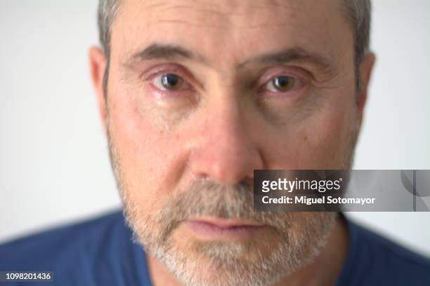 portrait of a sad man - eyes crying stock-fotos und bilder