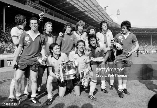 Arsenal, with the trophy, after their 3-2 victory over Manchester United in the FA Cup Final at Wembley Stadium, London on 12th May 1979. Back row,...