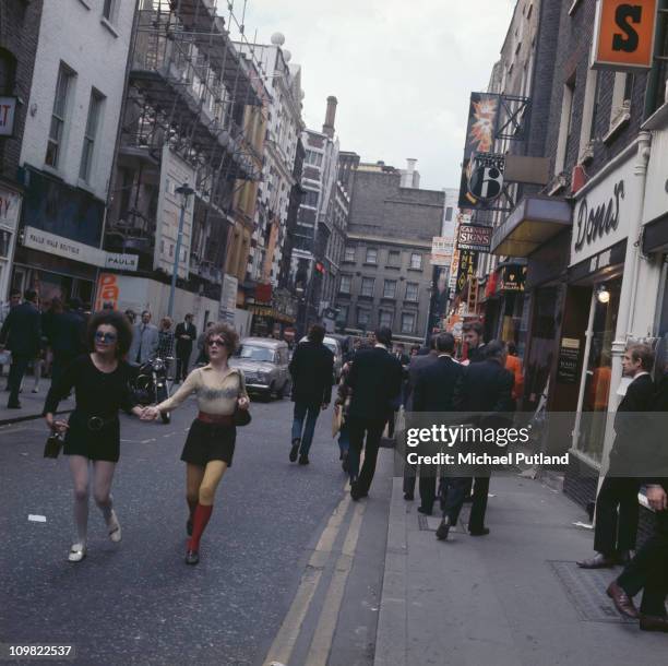Shoppers on Carnaby Street, London, circa 1968.