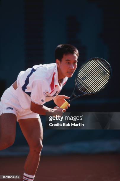 American tennis player Michael Chang competing in the French Open at the Stade Roland Garros, Paris, 1988.