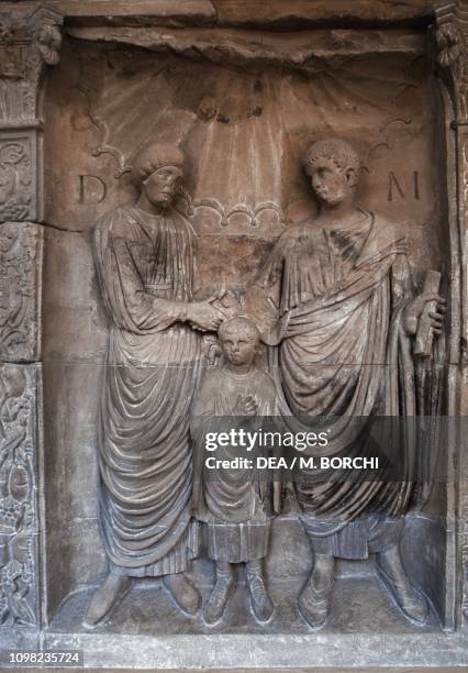 Parents with child, ca 220 AD, sandstone relief, detail of a patrician burial monument from Noviomagus Treverorum , Rhineland-Palatinate, Germany....