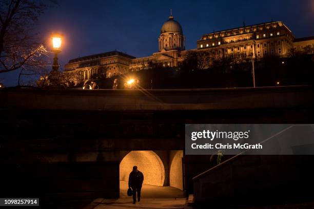 Man walks in a tunnel underneath Buda Castle on January 19, 2019 in Budapest, Hungary. Over the past months thousands of Hungarians have turned out...