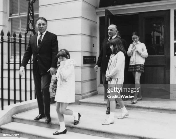 Welsh actor Richard Burton leaves the Fitzroy Nuffield Nursing Home in Mayfair, London, after visiting his wife, actress Elizabeth Taylor, 24th July...