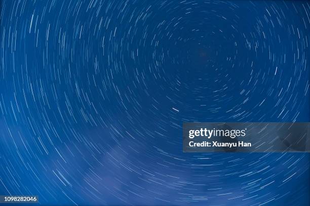 star trails at night - all the time stock-fotos und bilder