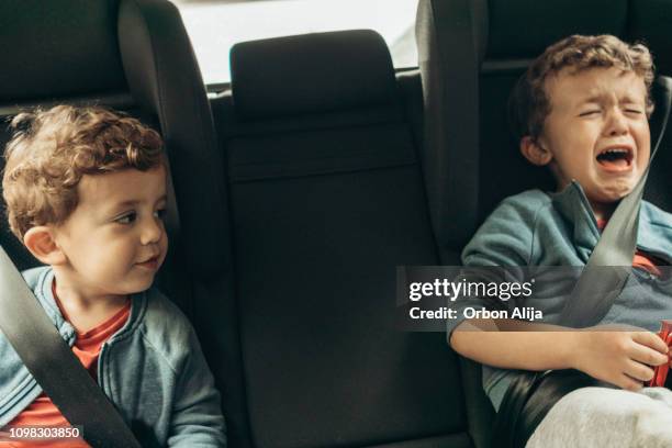 auto reis - angry child stockfoto's en -beelden