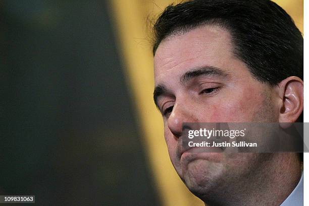 Wisconsin Gov. Scott Walker pauses as he speaks during a press conference at the Wisconsin State Capitol on March 7, 2011 in Madison, Wisconsin....