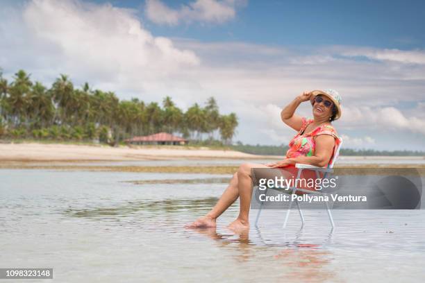 vacations - coconut beach woman stock pictures, royalty-free photos & images