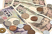 Close up image of Japanese Yen on a white background