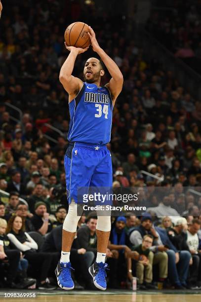 Devin Harris of the Dallas Mavericks takes a shot during a game against the Milwaukee Bucks at Fiserv Forum on January 21, 2019 in Milwaukee,...