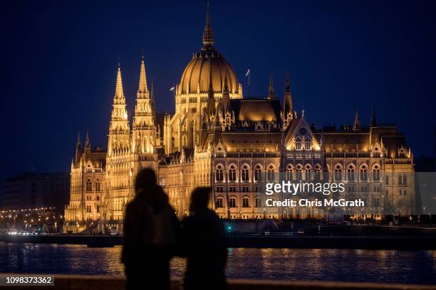 People look out over The Hungarian Parliament Building on January 19, 2019 in Budapest, Hungary. The Parliament building has become a site of growing...