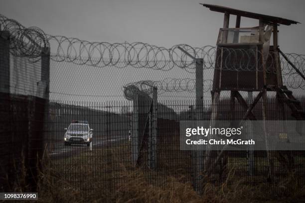 Police patrol the Hungarian border fence with Serbia on January 18, 2019 outside Szeged, Hungary. In 2015 thousands of migrants massed on the...