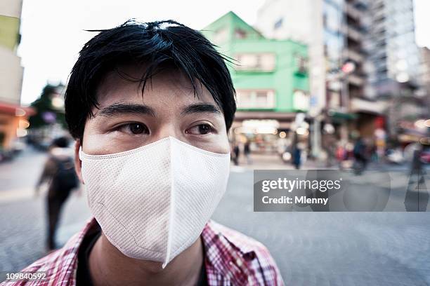 air pollution - air respirator mask stock pictures, royalty-free photos & images