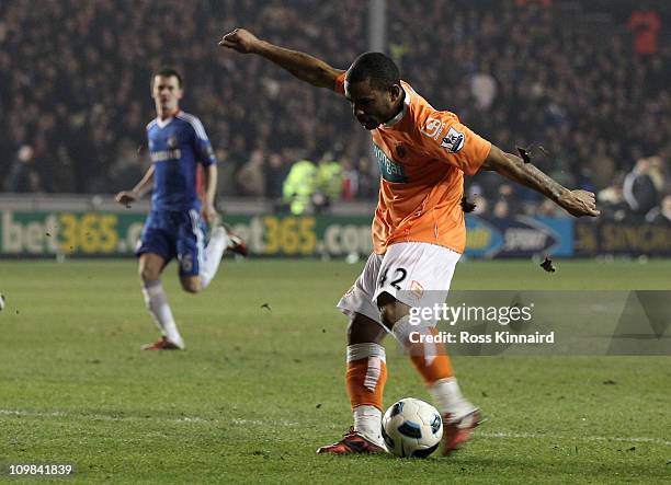 Jason Puncheon of Blackpool scores his team's first goal during the Barclays Premier League match between Blackpool and Chelsea at Bloomfield Road on...