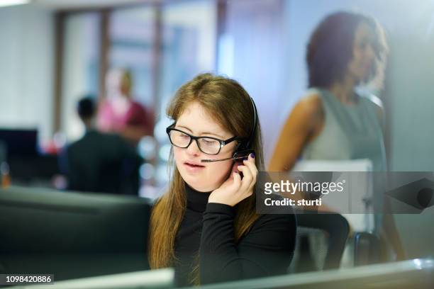 teenager office intern - disabilitycollection stock pictures, royalty-free photos & images