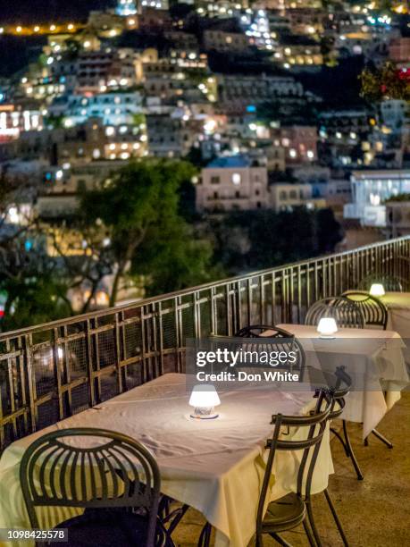 tourist town of positano in italy - private dining stock pictures, royalty-free photos & images