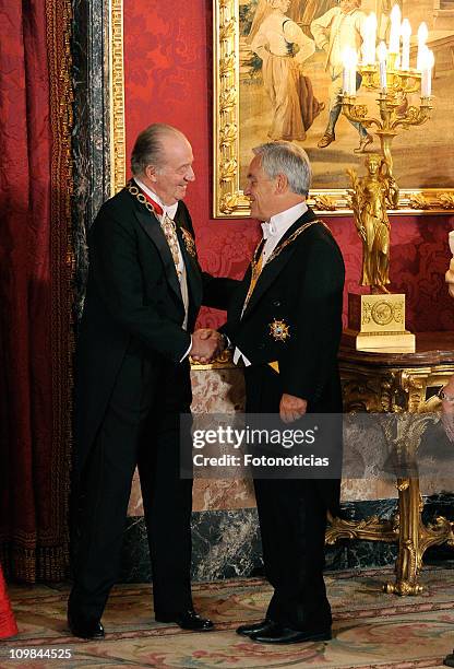 King Juan Carlos of Spain and President Sebastian Pinera attend a gala dinner in honour of Chilean President Sebastian Pinera at The Royal Palace on...