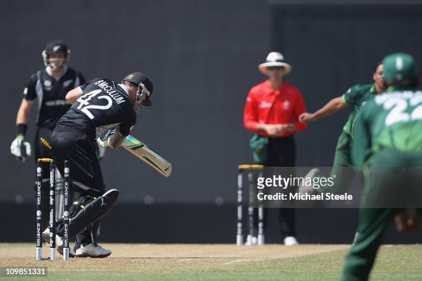 Brendon McCullum of New Zealand is bowled by Shoaib Akhtar during the New Zealand v Pakistan 2011 ICC World Cup Group A match at the Pallekele...