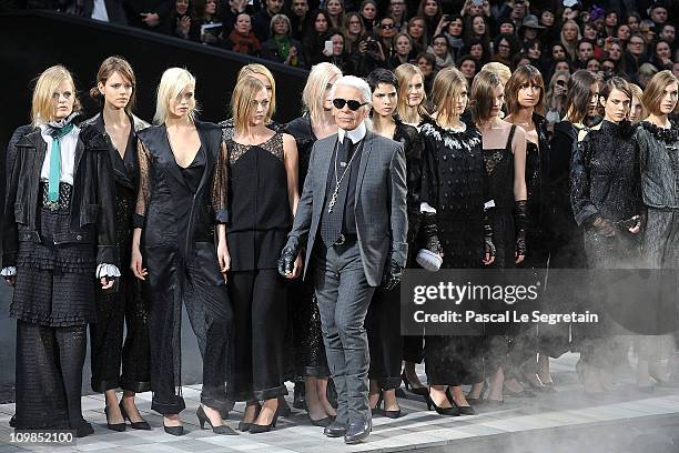 Karl Lagerfeld and models walk the runway during the Chanel Ready to Wear Autumn/Winter 2011/2012 show during Paris Fashion Week at Grand Palais on...