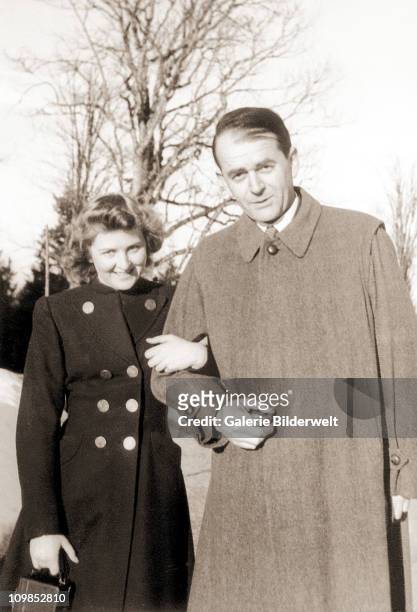 Eva Braun and architect Albert Speer walking together near Adolf Hitler's residence, the Berghof near Berchtesgaden, Germany, 1940. Eva Braun had a...