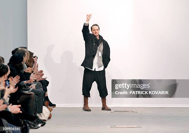 Croatian designer Damir Doma acknowledges the public following the Autumn/Winter 2011-2012 ready-to-wear collection show on March 2, 2011 in Paris....