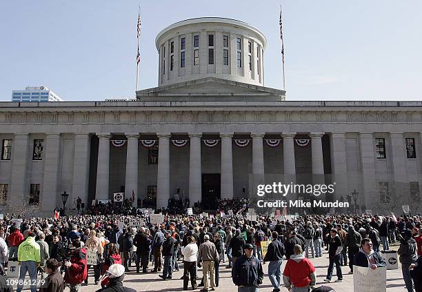 Protestors and union supporters gather as Ohio Gov. John Kasich delivers the State of the State address at Ohio Statehouse on March 8, 2011 in...