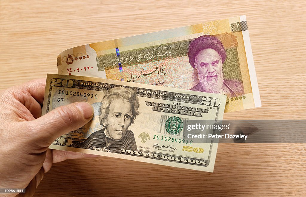 Iranian and US bank notes