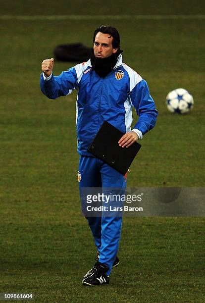 Head coach Unai Emery gestures during a FC Valencia training session ahead of the UEFA Champions League Round of 16 second leg match against FC...