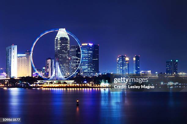 singapore flyer view at night - singapore flyer stock pictures, royalty-free photos & images