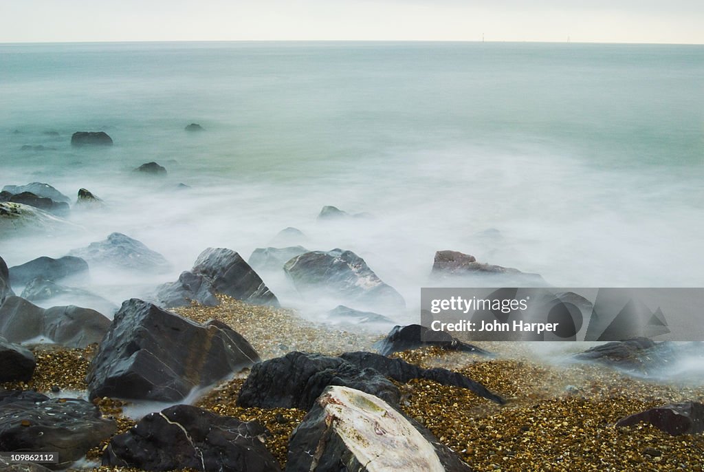 Rocks Covered In Mist Hayling Island Hampshire High-Res Stock Photo ...