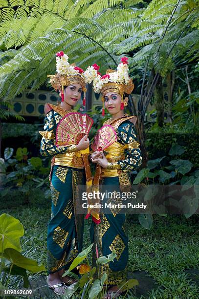 legong dancers wearing traditional clothing - balinese headdress stock pictures, royalty-free photos & images