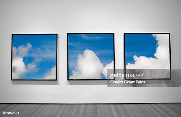 view of three framed photographs. - empty art gallery stock pictures, royalty-free photos & images