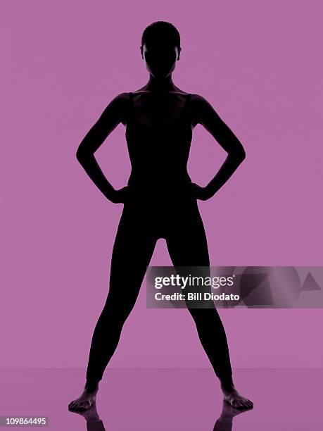 fitness work out on clean purple background - woman hand on hip stock pictures, royalty-free photos & images