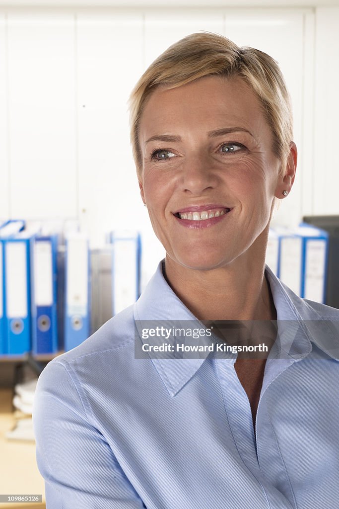 Female office worker smiling