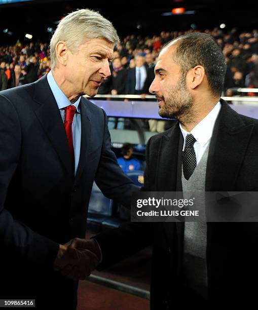 Barcelona's coach Pep Guardiola welcomes Arsenal's French coach Arsène Wenger before the Champions League round of 16 second leg football match FC...