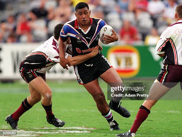 Ali Lauitiiti of New Zealand tries to run through a gap in the defense during the NRL match between the New Zealand Warriors and the Northern Eagles...