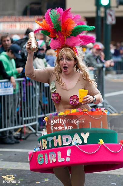 The Mondo Kayo Social and Marching Club make their way along the parade route on St. Charles Avenue during the Mardi Gras parade on Fat Tuesday in...