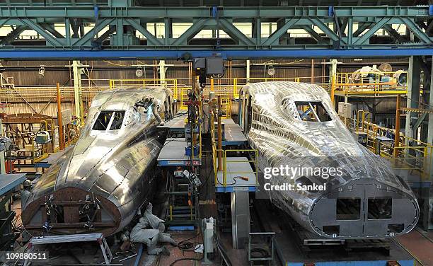 New N700 series Shinkansen bullet train are produced at Kawasaki Heavy Industry Ltd., Hyogo Factory on March 8, 2011 in Kobe, Japan. The front part...