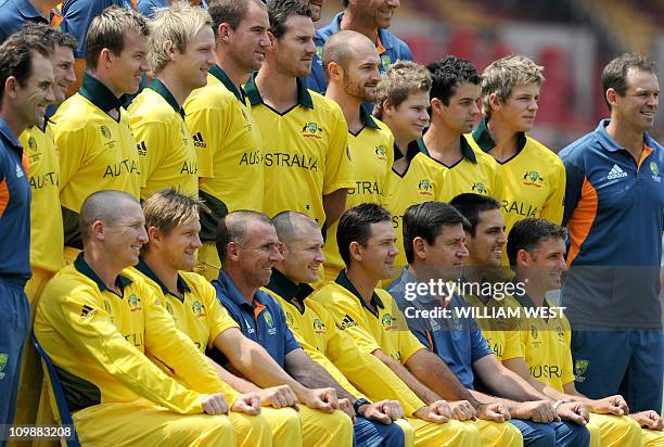 Australian cricketers pose for a team photograph before their training session in Bangalore on March 9, 2011. Australia is in the southern Indian...