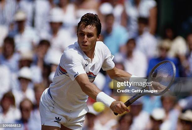 Ivan Lendl of Czechoslovakia reaches to make a return against Pat Cash during their Men's Singles Final match at the Wimbledon Lawn Tennis...