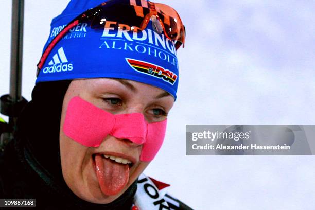 Magdalena Neuner of Germany reacts at the finish area after the women's 15km individual race during the IBU Biathlon World Championships at A.V....