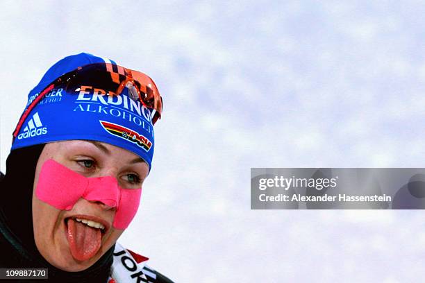 Magdalena Neuner of Germany reacts at the finish area after the women's 15km individual race during the IBU Biathlon World Championships at A.V....