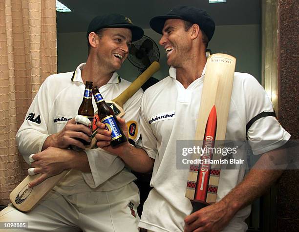 Adam Gilchrist and Matthew Hayden of Australia celebrate their centuries, after day two of the first test between India and Australia, played...