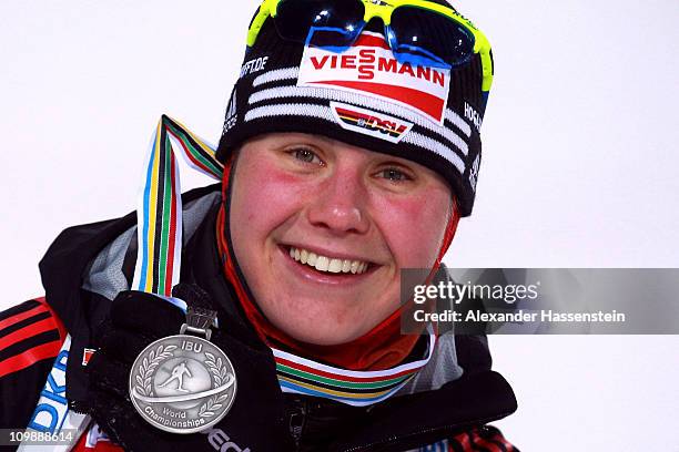 Tina Bachmann of Germany poses with her silver medal at the medal ceremony for the women's 15km individual race during the IBU Biathlon World...