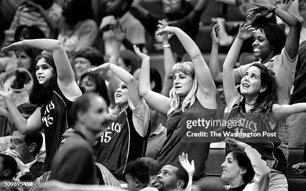 Center - Mystics BB Game - shots of the fans - ATTN: MICHEL du CILLE - Fans do the YMCA dance during a break in the Mystics game. - Photo By Gerald...